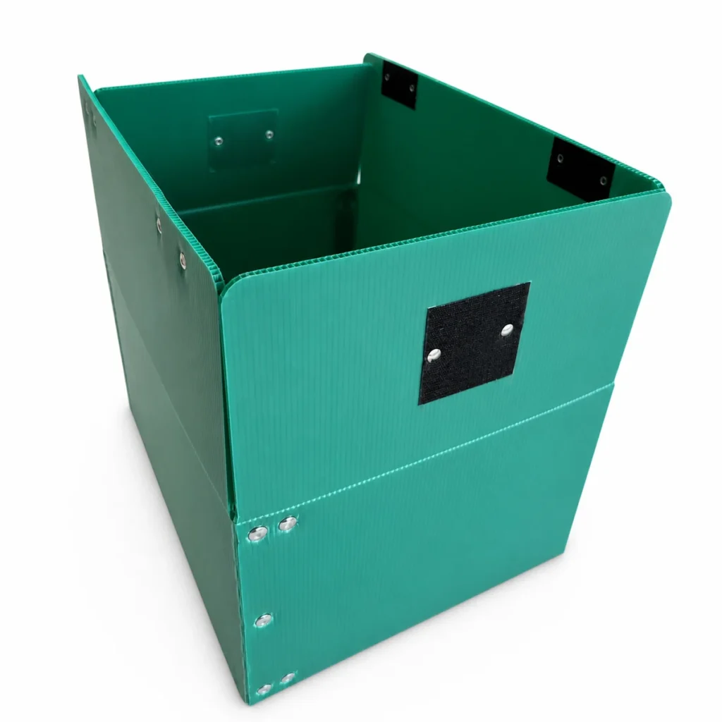 Green open corrugated plastic box on a white background