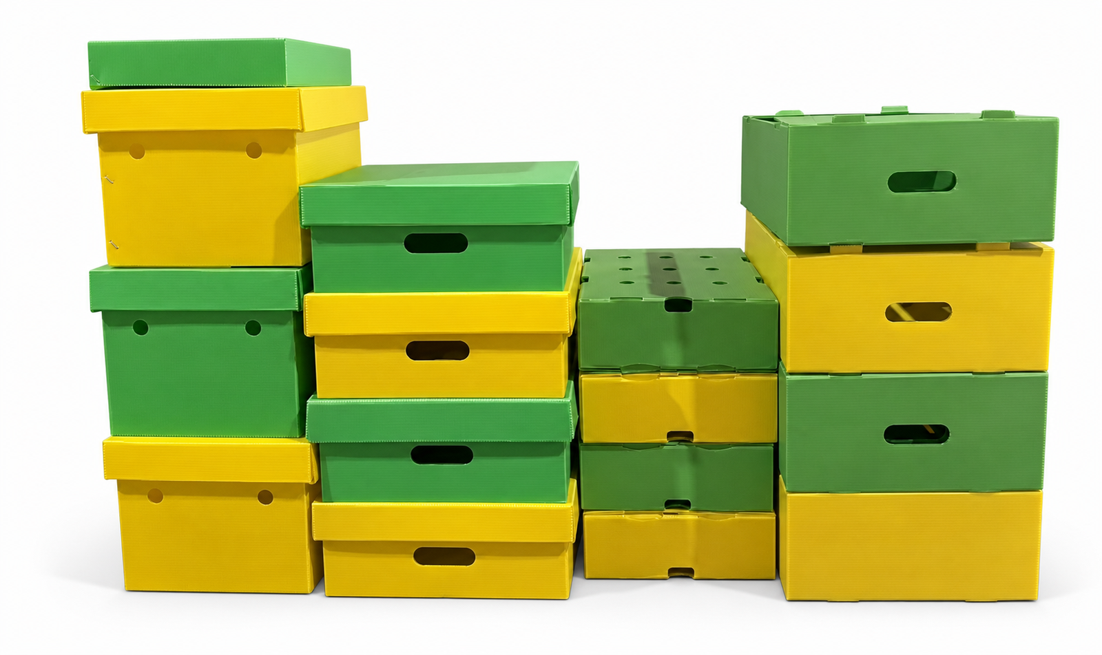Green and yellow reusable corrugated plastic produce boxes on a white background