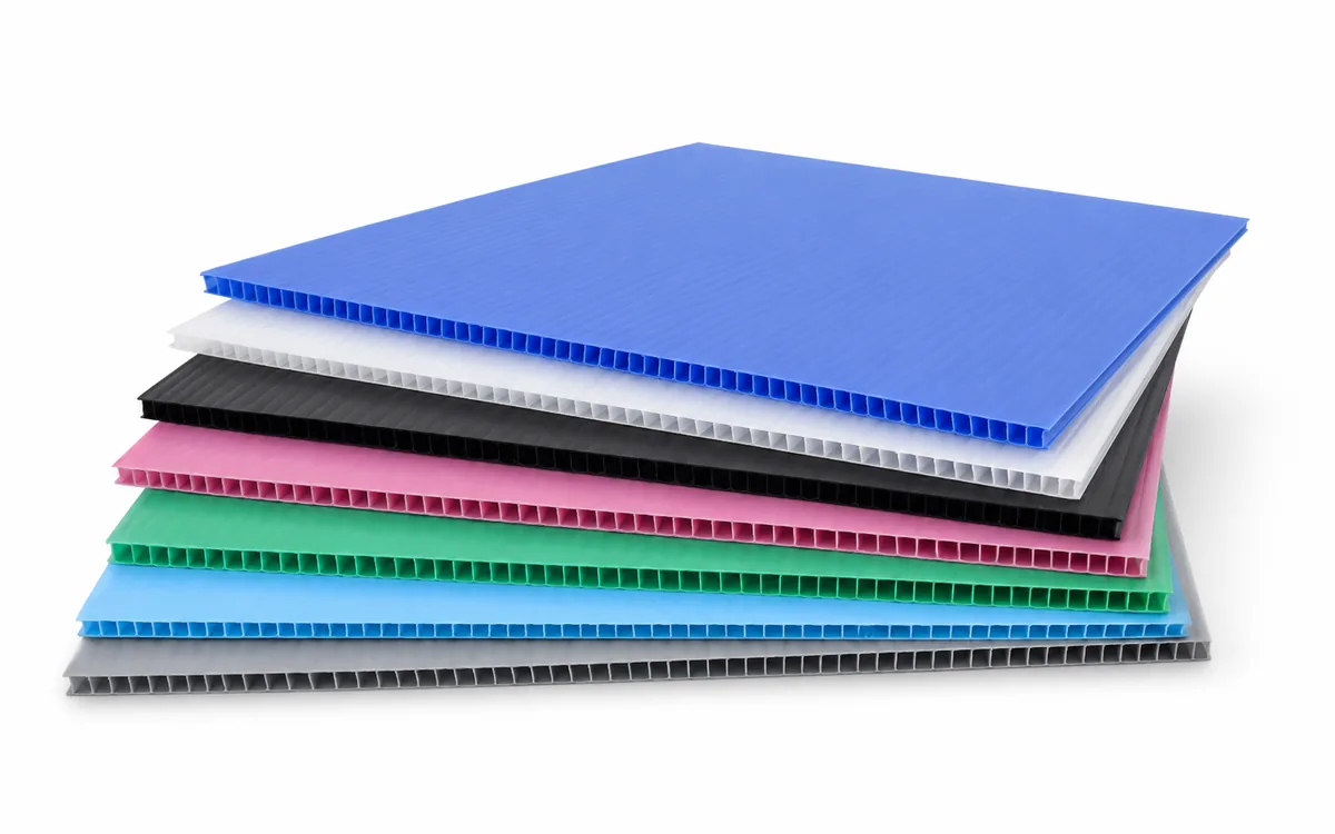 Colored corrugated polypropylene sheets on a white background