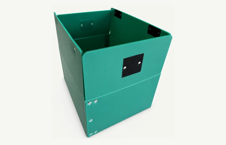 Green corrugated plastic box with an open top